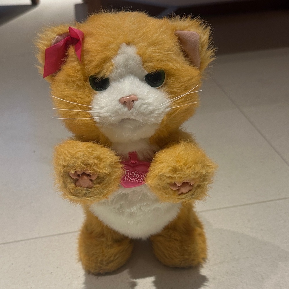 FurReal Friends Orange and White toy.